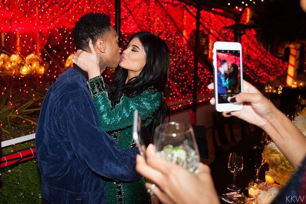Tyga and Kylie kissing Kardashians Kristmas Eve party