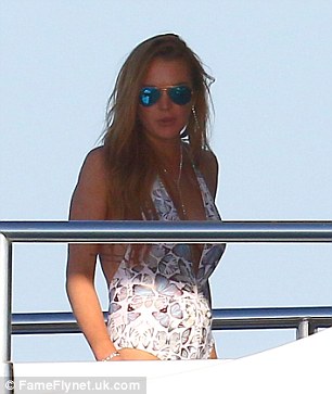 Feeling good: Lindsay appeared to be enjoying her down time as she walked around the Fathem yacht