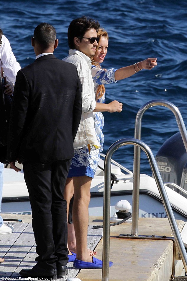 Nice to sea you: The pair looked out over the crystal clear waters before boarding the boat