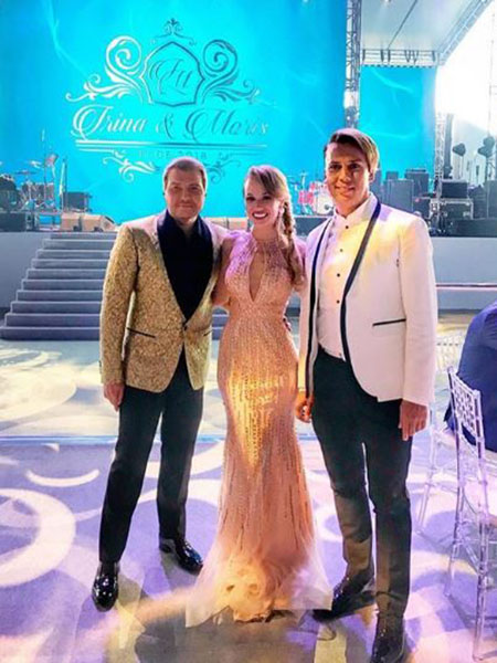 Nikolay Baskov and Maxim Galkin with a wedding guest